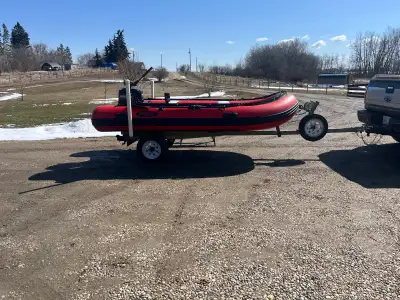 12’ Seamax inflatable boat Mercury 6hp motor Minn Kota electric trolling motor Includes trailer Vide...