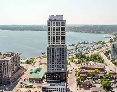 Experience luxury lakeside living in downtown Barrie at the Debut Waterfront Residences! This stunni...