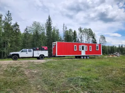 I am selling a home-built tiny home trailer. It is a self-contained cozy little unit that is registe...