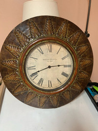 Metal rustic large wall clock. 24 inch diameter.