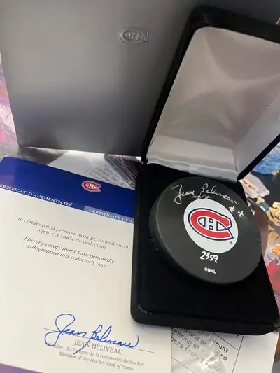Montreal Canadians autographed puck in case., View more