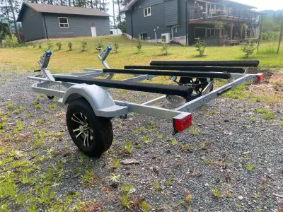 I'm selling a Karavan dual jet ski trailer is brand new, never used. ready to haul your skis to the...