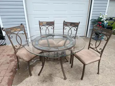Bevelled glass top dining room table and chairs., View more