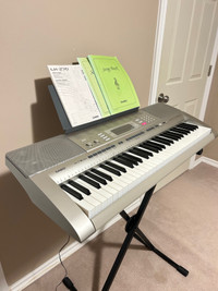 Keyboard with semi weighted &touch response keys and accessories