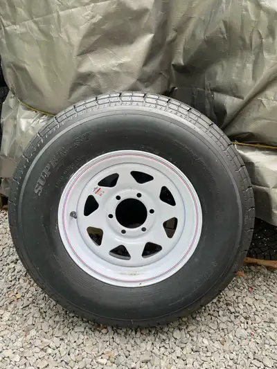 Brand new, never used, purchased this spring as a spare for a long haul for a destination trailer. 6...