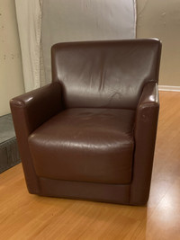 Leather armchair with an ikea side table