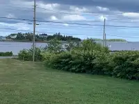 Move to Nova Scotia and have ocean view property with a wharf