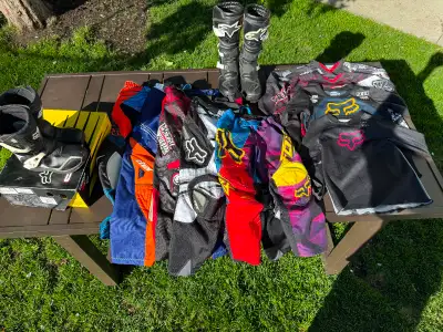 Kids motocross boots pants and jerseys all worn when my kids were on pw50 and ktm50 sized bikes Fox...