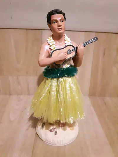 This hula man dashboard doll is a vintage reproduction from the 1950's. Place on your dashboard and...
