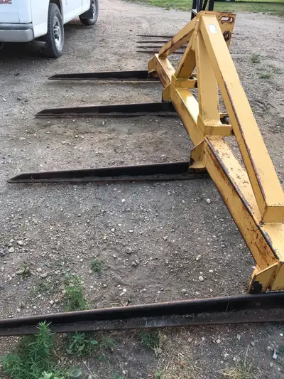3 - Point Hitch Round Bale Fork Holds 2 bales $1,100.00 plus taxes Contact 306-four95-seven 51seven
