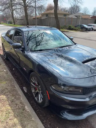 Charger Srt in Maximum steel Metallic in like very excellent condition all SRT performance pages loa...
