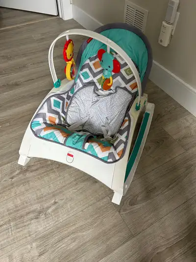 Massaging baby rocker. Gently used. $25. Pick up only.
