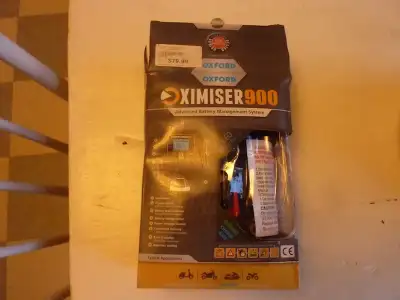 USED ONCE. Has clips so you can charge a battery. Can also be permanently attached to your battery t...