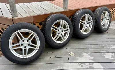 Selling a complete set of four 17-inch alloy wheels mounted with Uniroyal Tiger Paw Ice & Snow 3 win...