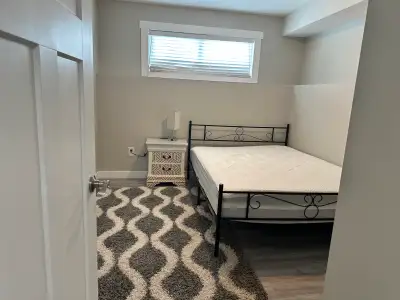 Private room for rent Cozy new basement suite, furnished your own bathroom and tv all as shown in th...