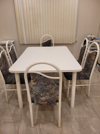 DISCOUNTED-Used white dining table with 6 upholstered chairs
