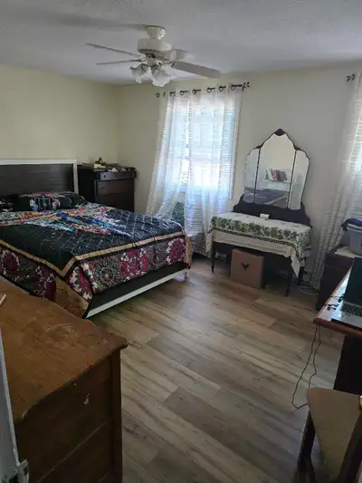 Master Bedroom furnished in White Oaksi condo. Shared bathroom Owner occupied No first and last requ...