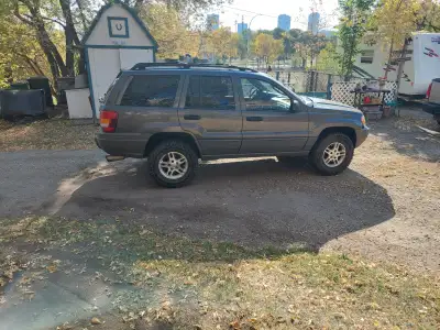 Ready for sale. Jeep grand cherokee 2002 Purchased newer vehicle. This jeep would make a good acreag...