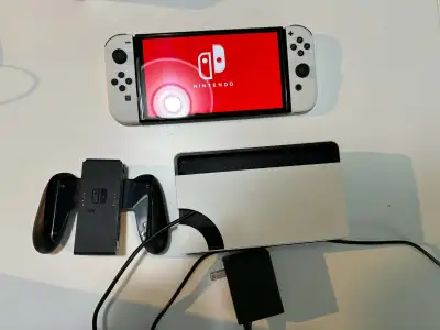 Nintendo Switch OLED White – Console, Dock, Joy-Cons & Charger, View more