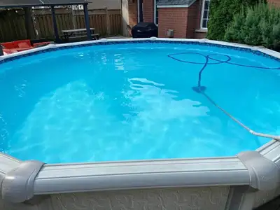 21 foot round above ground swimming pool. It's 52" deep and in good condition. Comes with sand filte...