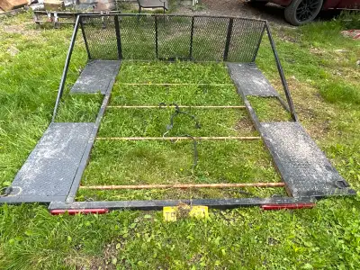Selling trailer/flat deck frame roughly 98x97in. Was made for hauling two four wheelers, led taillig...