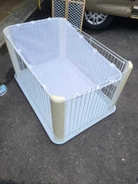 Pet fence,  4 metal panels with door and plastic floor