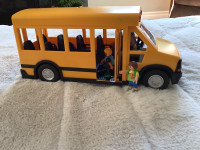 Playmobile school Bus with lights and 3 people.