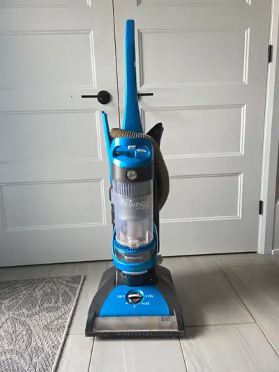 Hoover Elite Rewind Plus+ Vacuum Cleaner. Works great and has all attachments.