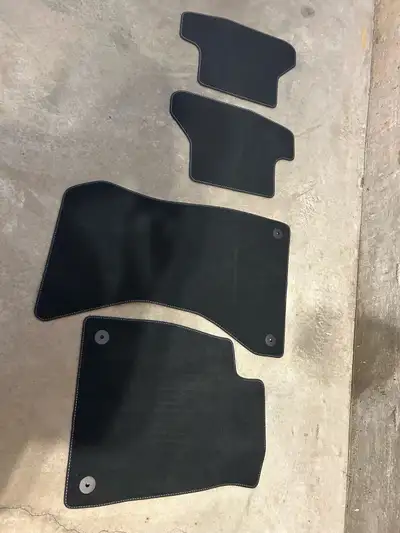 These are carpet floor mats that came out of my Audi S5. They are in used condition, but still have...