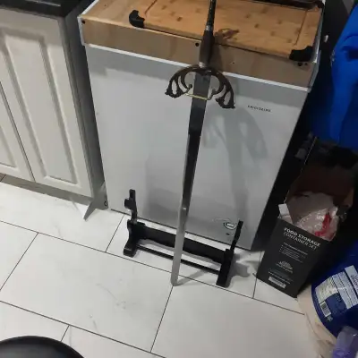 40 inch steel sword, comes with a display stand. Very heavy and quite sharp. For display purposes on...