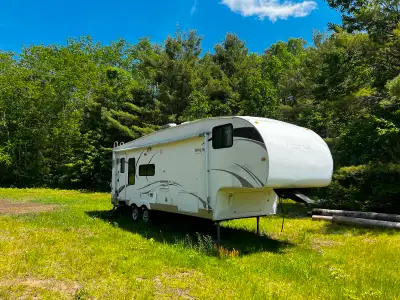 2009 K Line Malibu Ultra Lite 5th Wheel Trailer. Everything works as it should. We used it full time...
