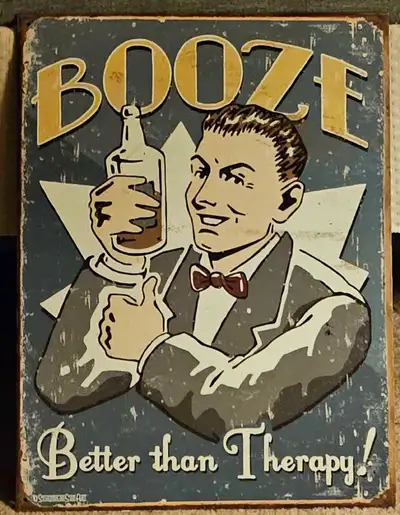 Vintage metal booze sign Approximately 14 x 17 inches From about the mid 90s