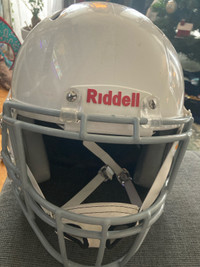 Football helmet and shoulder pads