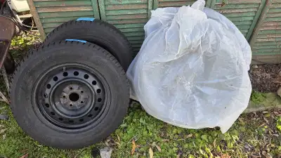 Four Continental winter tires, 215 70 16 on rims that fit 2017 Toyota Rav 4. Tires used part of two...