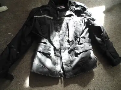 I have a Tour Master transition motorcycle jacket for sale size xl very good cond. price 100.00 OBO...