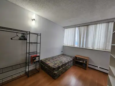 Private furnished room available in a bright and well-maintained shared apartment near 118 Ave and 8...