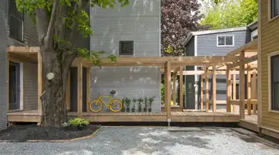 **LEASE TAKEOVER** Design-oriented loft-style townhouse near the Common. Enjoying a coveted location...