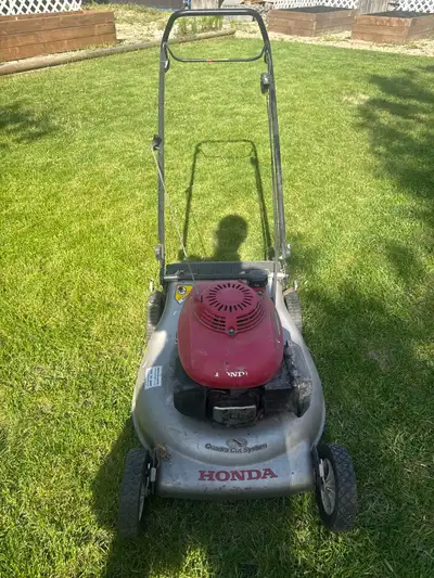 I'm selling a used Honda lawn mower that's ready to tackle your lawn. It has a reliable engine and a...