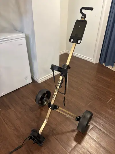 Lightly used golf push cart. Only issue is a broken clasp on the lower strap. Everything else works...