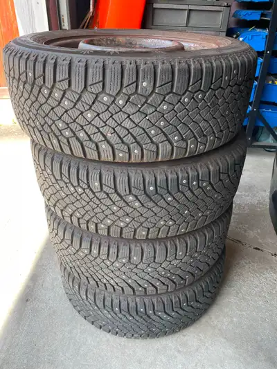 Selling 4 Studded Continental Winter tires on rims 205/55/R16 5x100 bolt pattern 54.1mm center hub b...