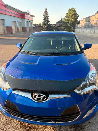 Excellent fuel efficiency ride with unique blue interior lighting and two sets of tires- regular win...