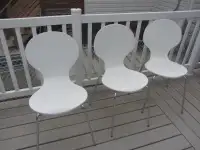 3 whit stacking chairs