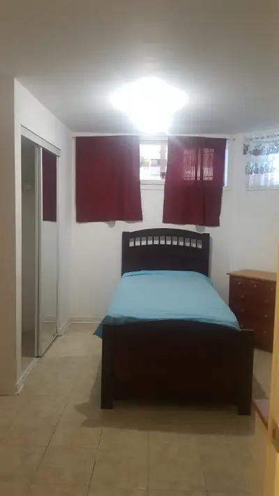 Private room for a girl, a walkout basement, a large closet, windows, and it is very clean and shoul...