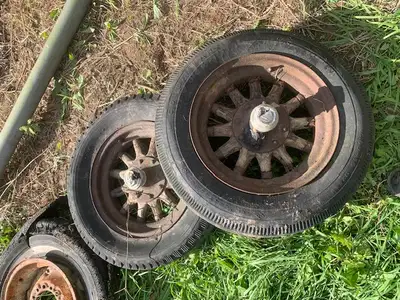 2 old wooden spoke rims and tires tires are no good Pick up in ayton