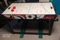 Air hockey and activity table
