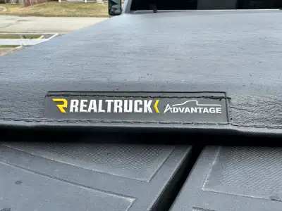 GM accessory: soft folding tri-cover allows easy access to the bed of your truck; fits GMC/CHEV 2500...