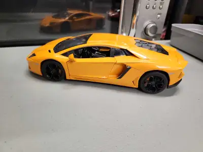 New no box. Light orange metallic color.