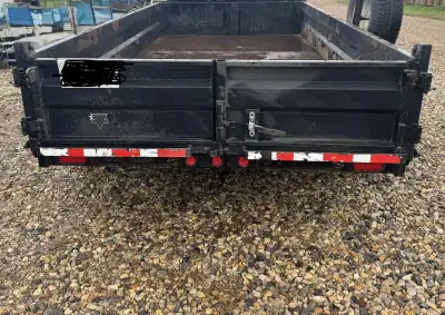 2013 12’x6.5’ Pj dump Trailer, tarp, 5200lbs axles good rubber spare tire everything works as it sho...