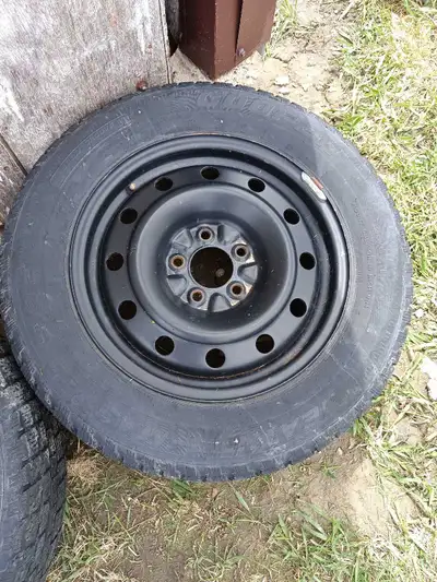 Winter tires and rims. Rims are 5x114.3 bolt pattern. Came off of a dodge caliber. Tread is mostly w...