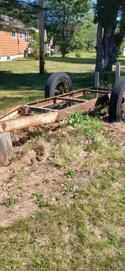 for sale woods trailer with swivel hitch, over eight feet between posts